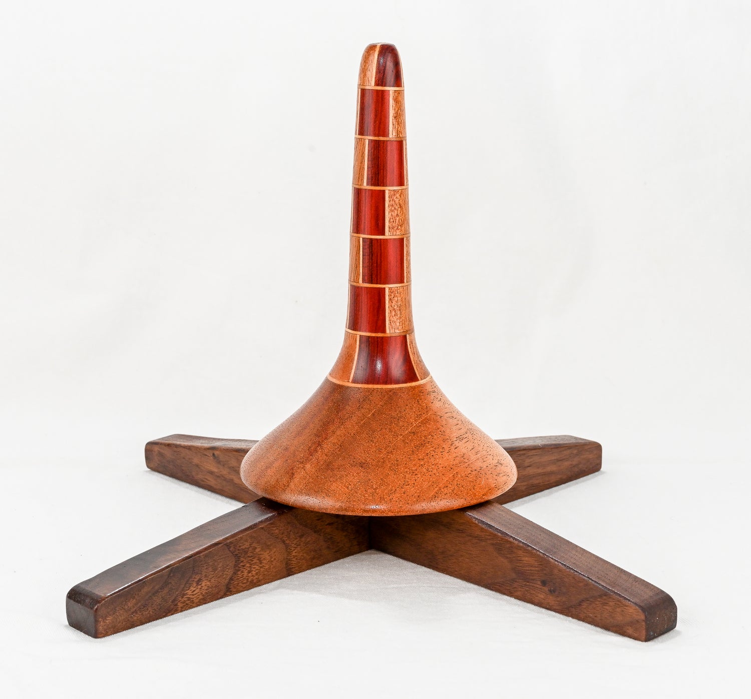 handmade african mahogany and redheart segmented trumpet stand with walnut legs