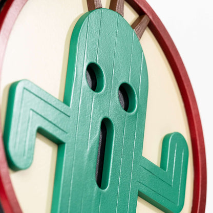 A handmade and hand-painted carved wooden sign featuring a Cactuar from the Final Fantasy series of video games.