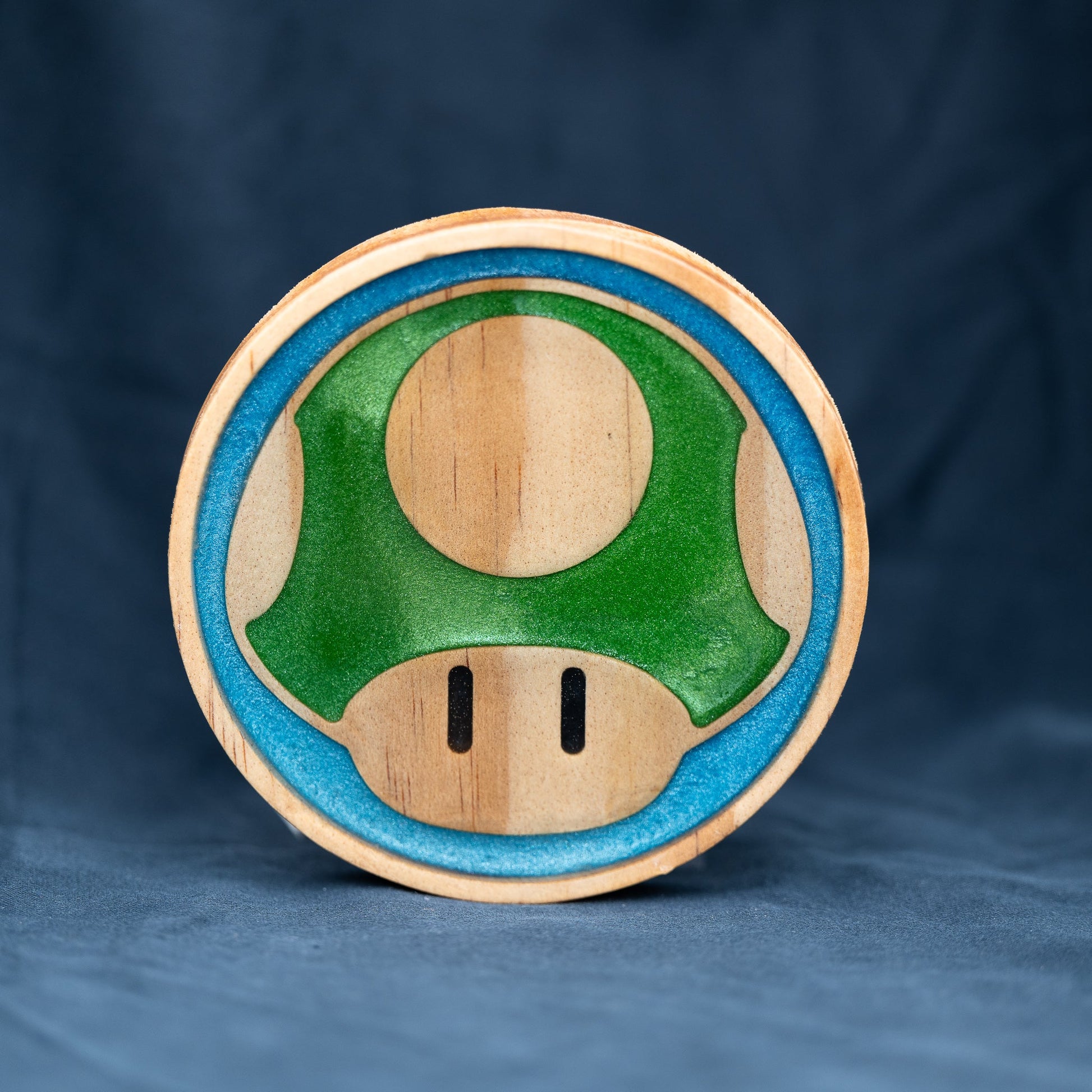 Handmade wood and purple, red, green, gold, and blue resin Mario mushroom drink coasters