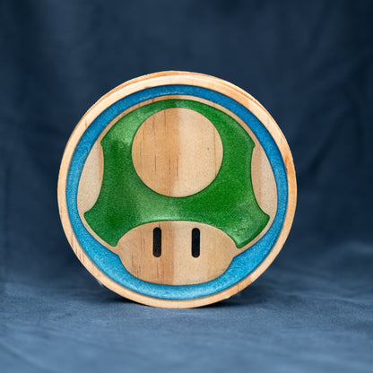 Handmade wood and purple, red, green, gold, and blue resin Mario mushroom drink coasters