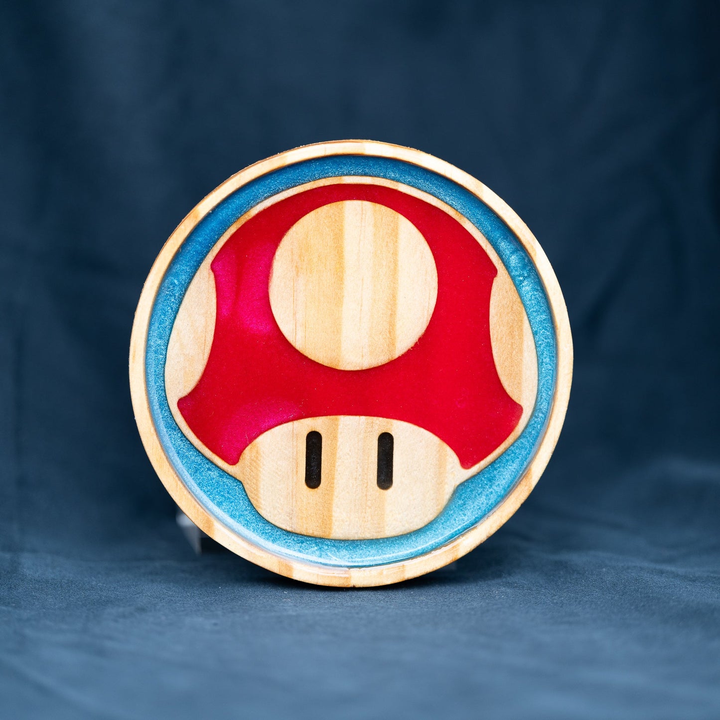 Handmade wood and purple, red, green, gold, and blue resin Mario mushroom drink coasters