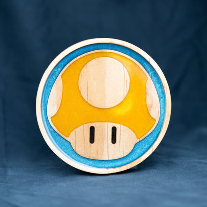 Handmade wood and purple, red, green, gold, and blue resin Mario mushroom drink coasters