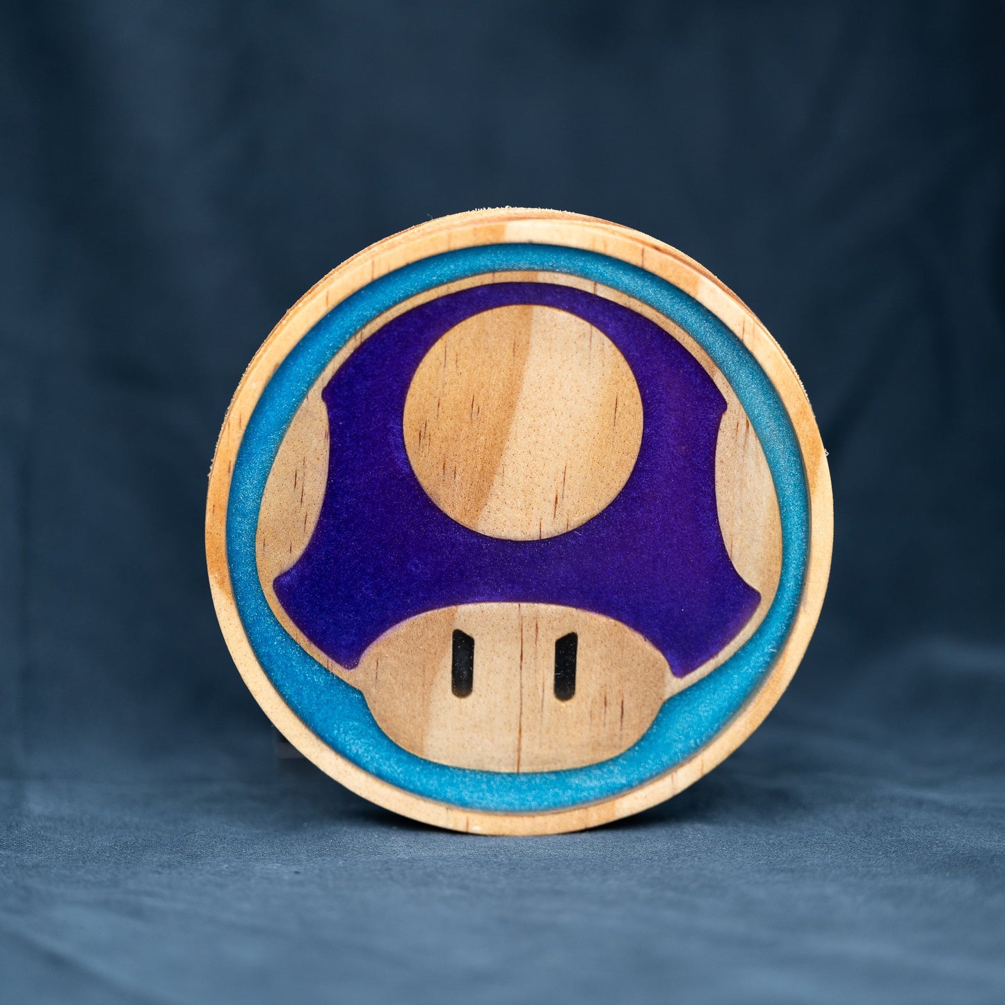 Handmade wood and purple, red, green, gold, and blue resin Mario mushroom drink coasters