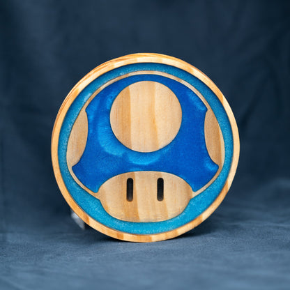 Handmade wood and purple, red, green, gold, and blue resin Mario mushroom drink coasters