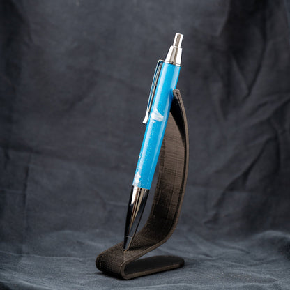 Handmade blue and white resin click ballpoint pen with chrome plating and black ink.