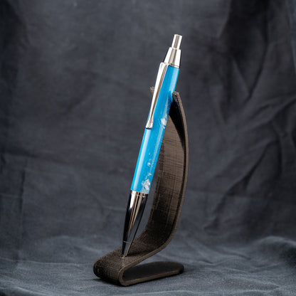 Handmade blue and white resin click ballpoint pen with chrome plating and black ink.