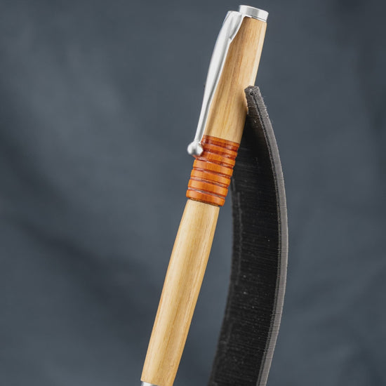 A short video featuring steps to create the handmade canarywood and osage orange ballpoint pen.