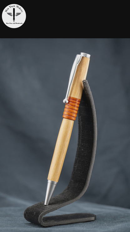 A short video featuring steps to create the handmade canarywood and osage orange ballpoint pen.