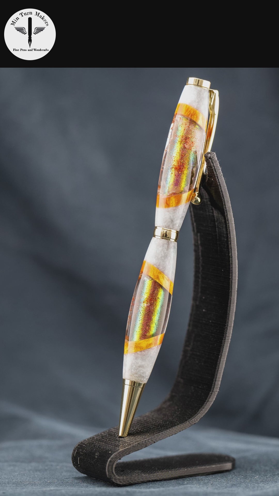 A short video highlighting the steps taken to create the custom red, gold, and white resin ballpoint pen.