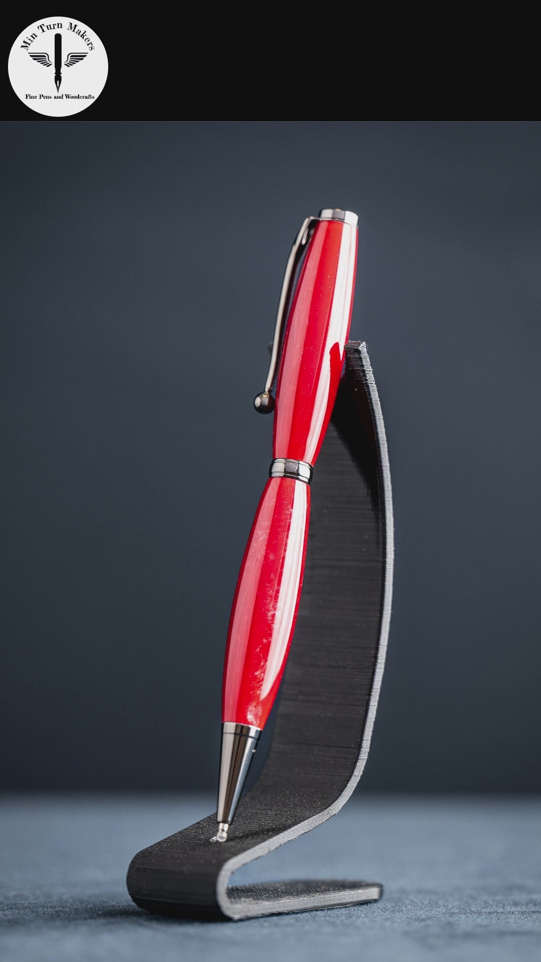 A video showing the steps taken to create a handmade red resin ballpoint twist pen