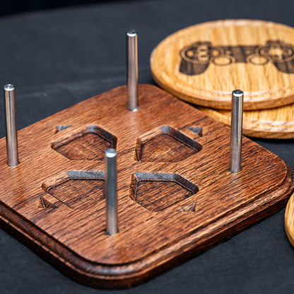 A handmade Red Oak drink coaster stand with video game controller design.