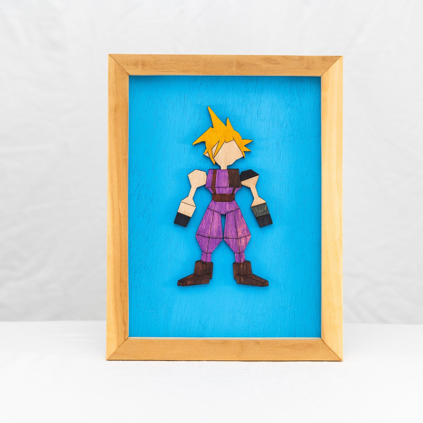 Handmade wooden Cloud Strife from the Final Fantasy VII video games in a Poplar wood frame.