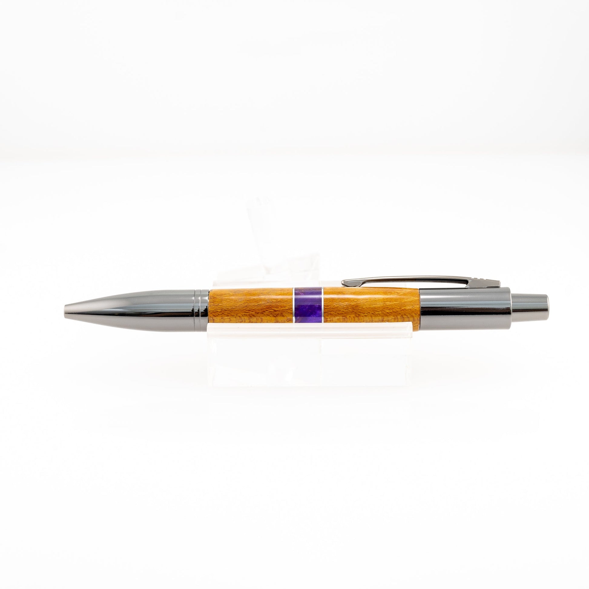 Handmade Osage Orange wood pen with purple segment separated by aluminum bands and gunmetal plating