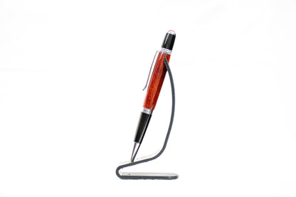Handmade Bloodwood twist pen with protective finish in black and chrome plating