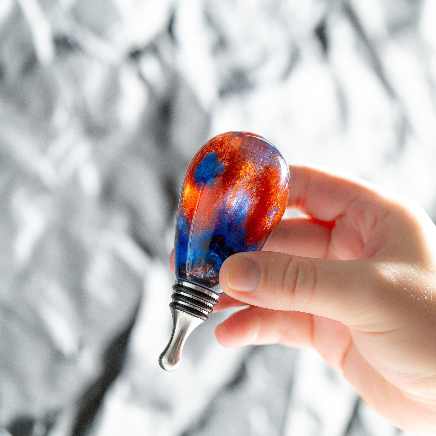 Handmade heavy blue and copper resin and stainless steel bottle stopper