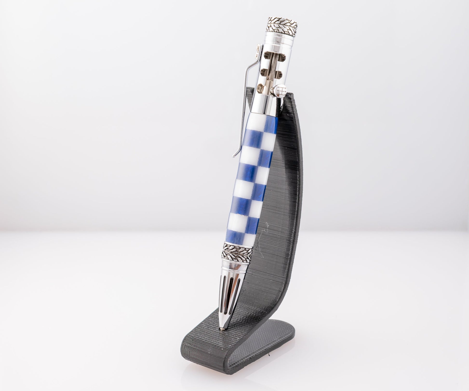 Handmade blue and white resin checkered bolt action click pen with chrome racecar theme accents