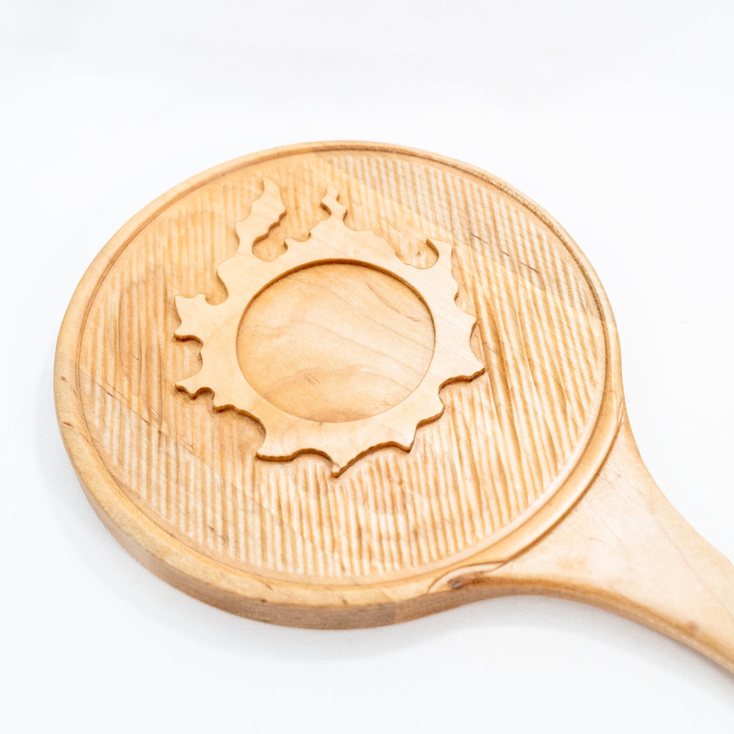Handmade solid maple hand mirror with engraved cactuar characters around the glass and carved out meteor symbol on the back