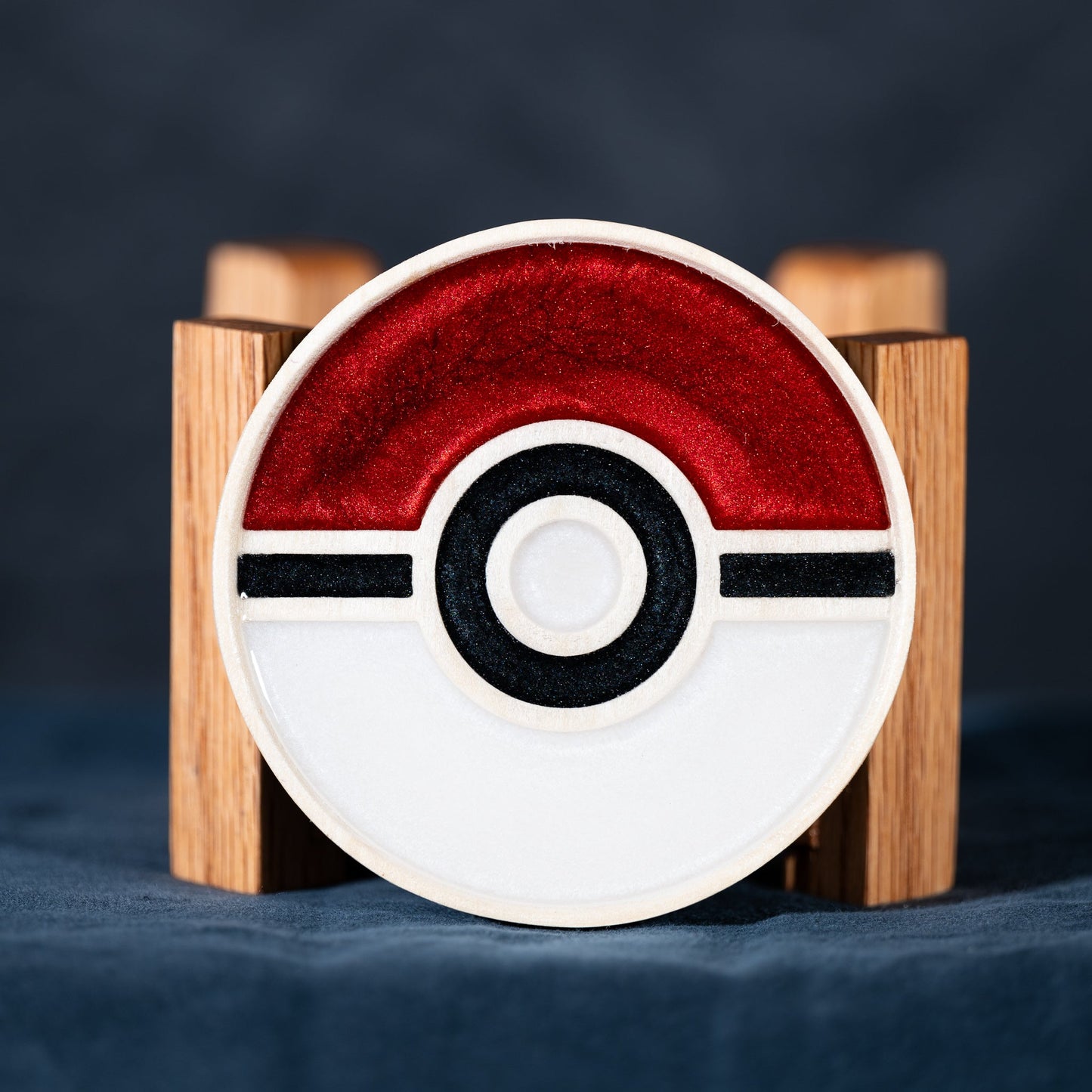 Handmade carved wood and resin Poké Ball drink coaster