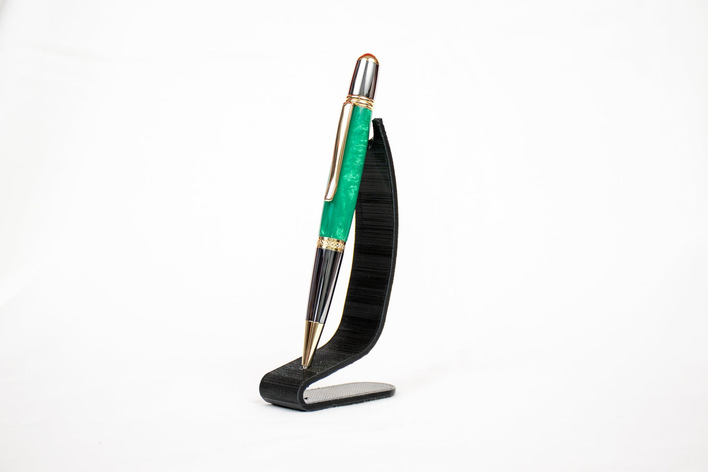 Handmade green and green sparkle resin twist pen with two-tone gunmetal and gold plating