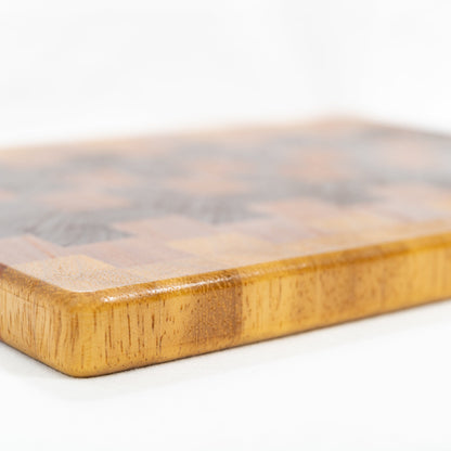 Handmade solid wood cutting board made of Iroko, African Mahogany and Nogal wood's with food grade safe finish