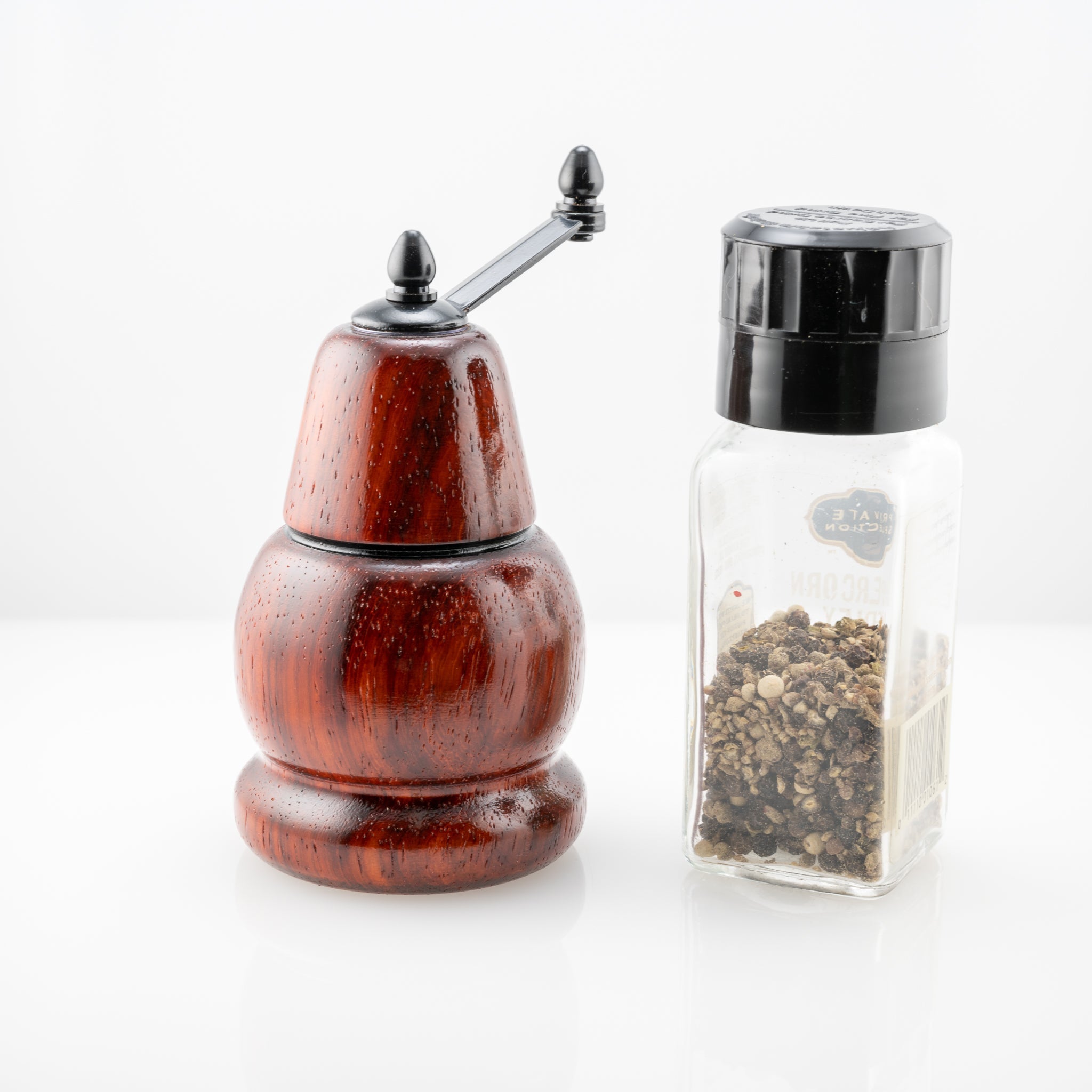 Handmade padauk wood mini pepper or salt mill with black enamel handle