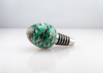 handmade pine cone and green and white resin bottle stopper