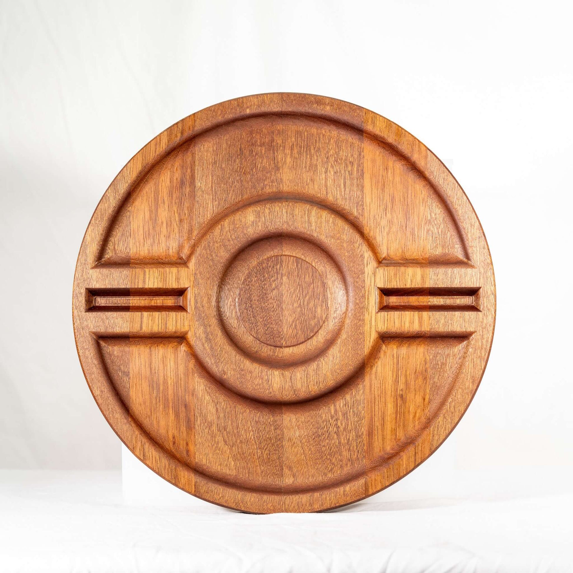 A solid, handmade Jatoba carved wood Pokémon Poké Ball party platter
