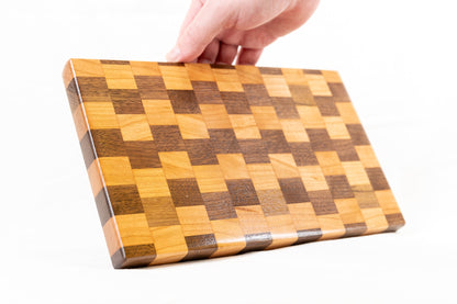 handmade walnut and cherry wood illusion cutting board