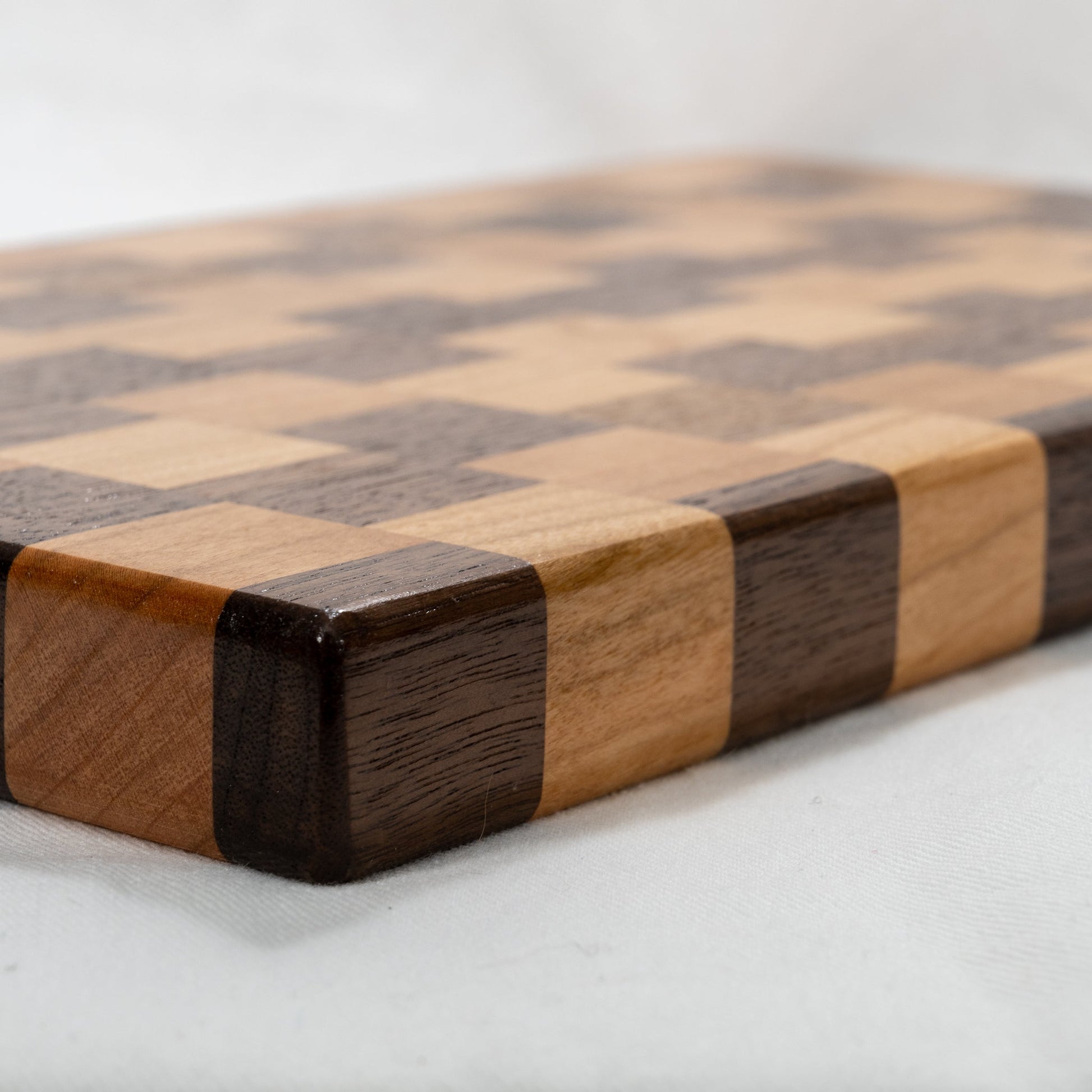 handmade walnut and cherry wood illusion cutting board