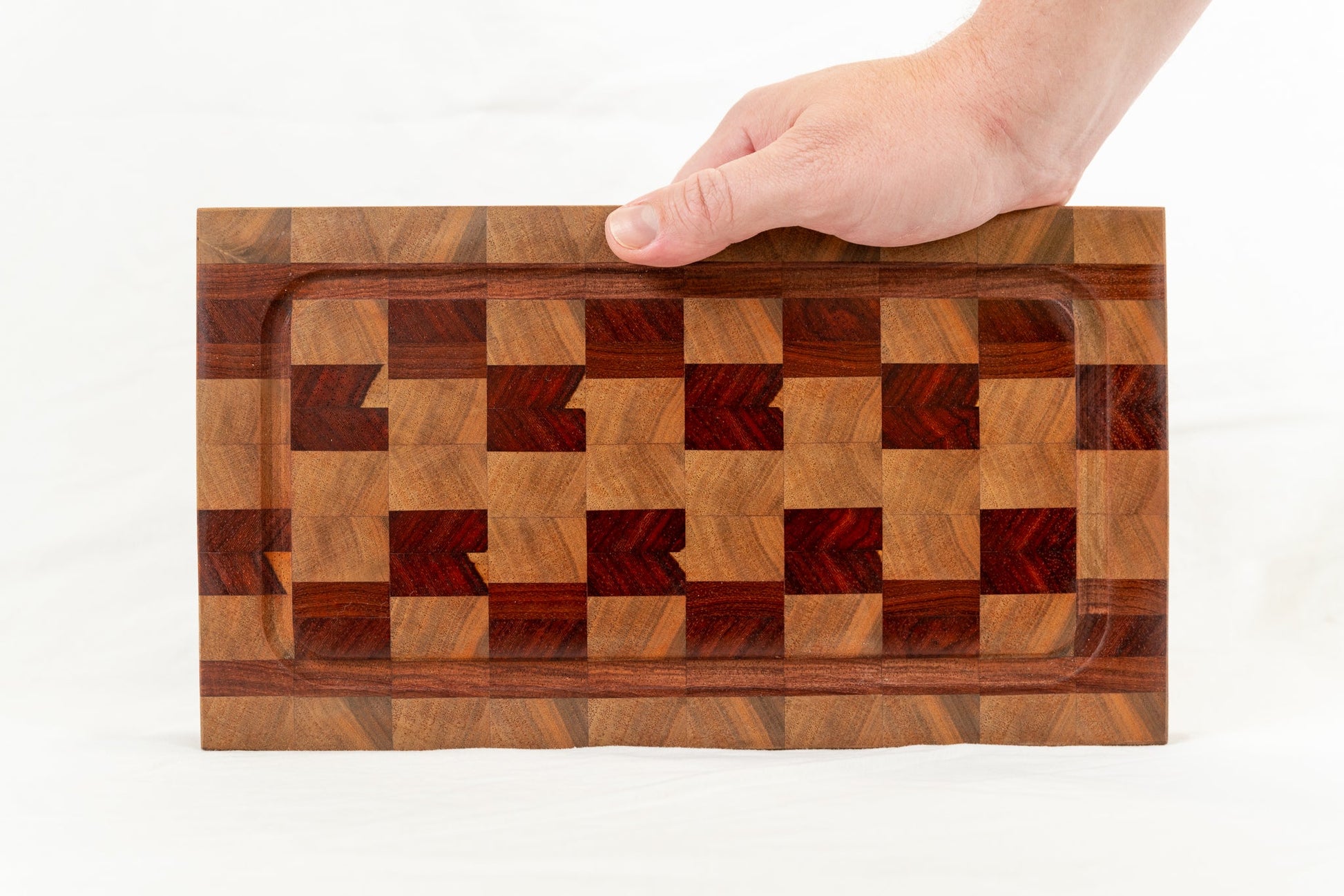 handmade padauk and walnut wood end grain cutting board